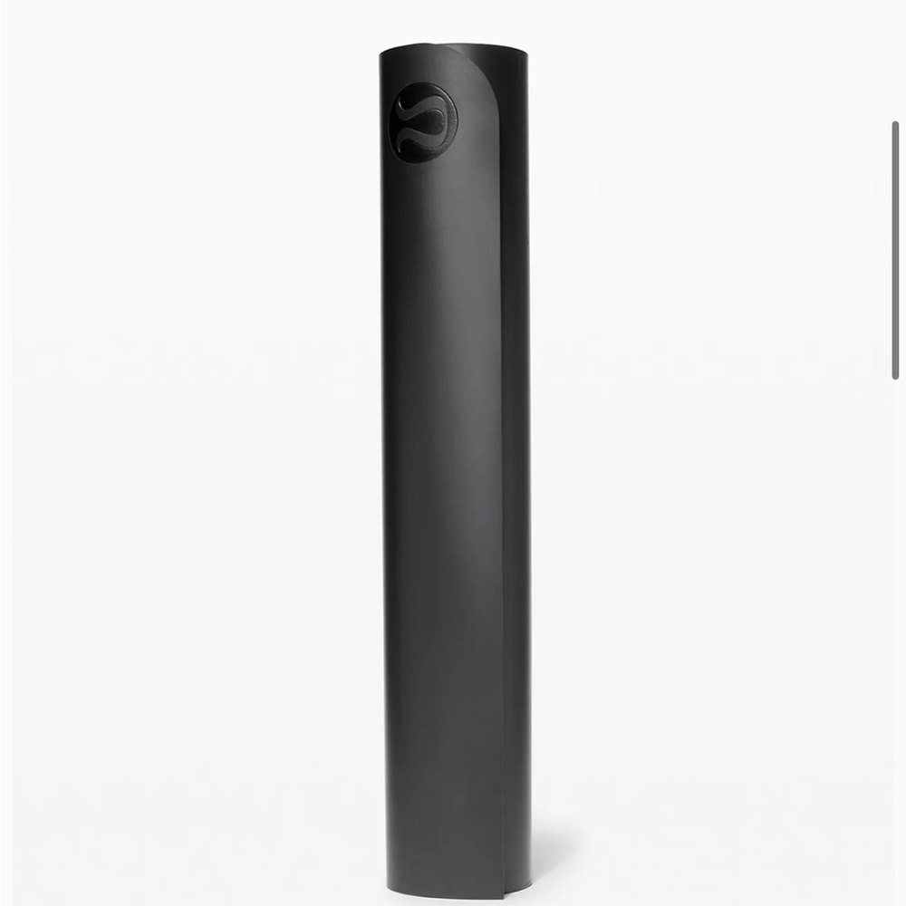 BRAND NEW! With wrapping, black Lululemon yoga mat.